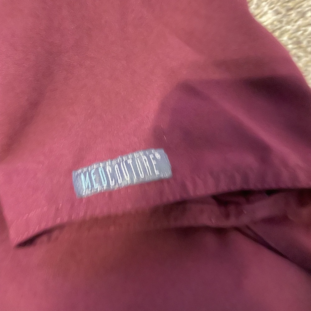 COPY - Med Couture size X-Small scrubs top and jogger bottoms in a Wine color